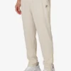 Pantalón deportivo de tenis tejido para cancha, color beige