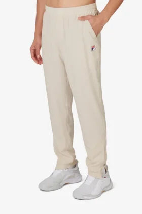 Pantalón deportivo de tenis tejido para cancha, color beige
