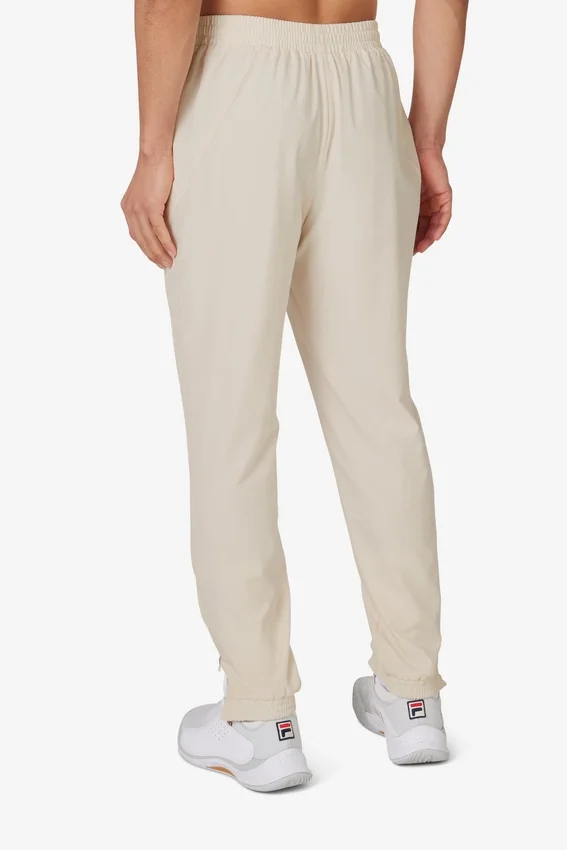 Pantalón deportivo de tenis tejido para cancha, color beige