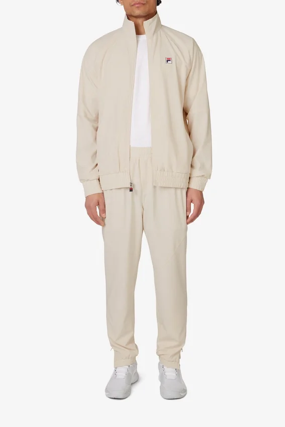 Pantalón deportivo de tenis tejido para cancha, color beige