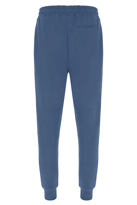 Pantalón deportivo Visconti de color índigo vintage con puños ribeteados