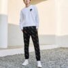 Pantalones casuales de punto con monograma para hombre, color negro