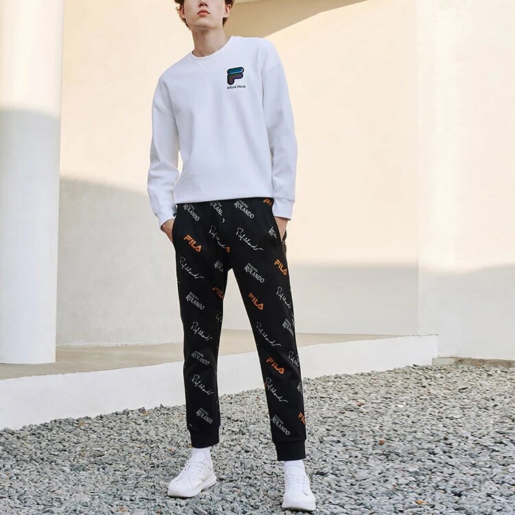 Pantalones casuales de punto con monograma para hombre, color negro