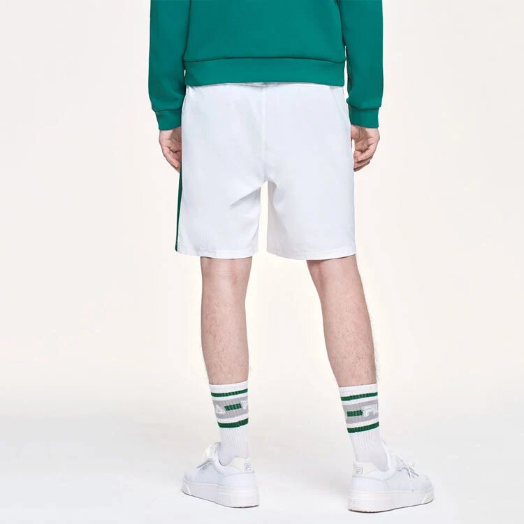 Pantalones de tenis transpirables con tejido lateral para hombre, color blanco