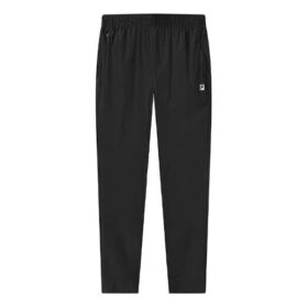 Pantalones largos deportivos holgados con estampado de logotipos atléticos, color negro