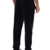 Pantalones negros de terciopelo de pierna recta de Wella