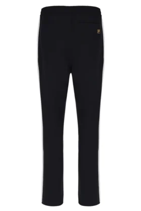 Pantalones negros inspirados en el tenis de Ali