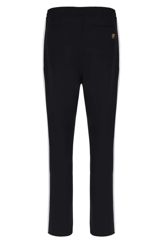 Pantalones negros inspirados en el tenis de Ali