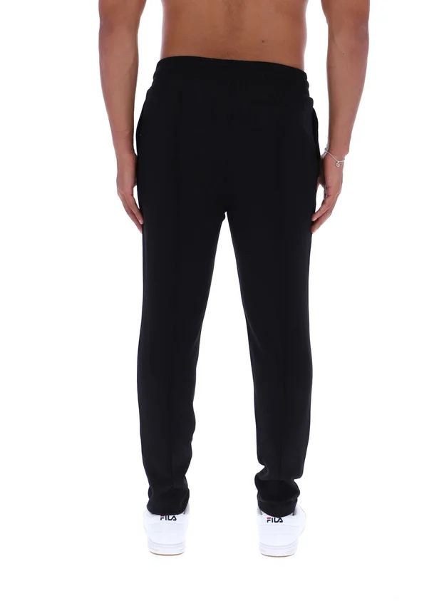 Pantalones negros Molveno de corte ajustado con pliegues finos