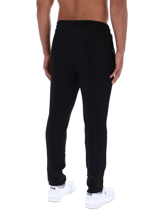 Pantalones negros Molveno de corte ajustado con pliegues finos