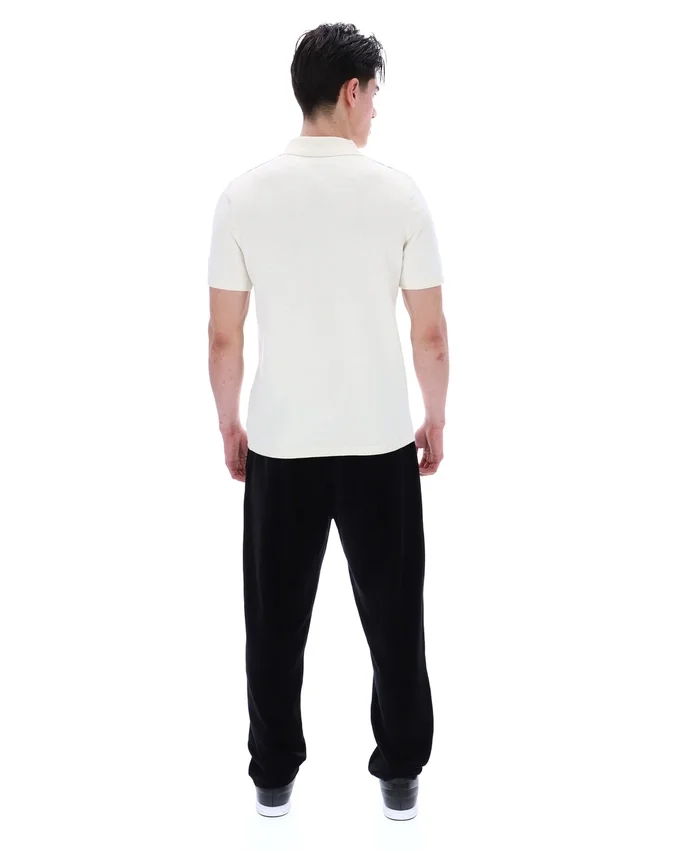 Polo de punto estilo Buddy Bowling en azul Sterling
