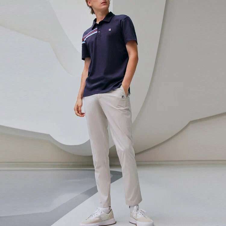 Polo deportivo casual de pantalones cortos con rayas de colores contrastantes para hombre, azul