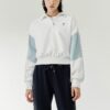 Sudadera deportiva de cuello alto con media cremallera y capucha en colores contrastantes, blanca