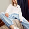 Suéter deportivo de cuello redondo para hombre Fila x Pepe Shimada con estampado de caricaturas, blanco