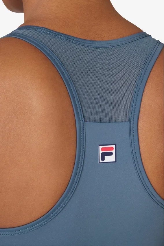 Top azul de tenis Essential con espalda en forma de U