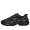 Zapatillas de correr de caña baja con estampado de leopardo, color negro